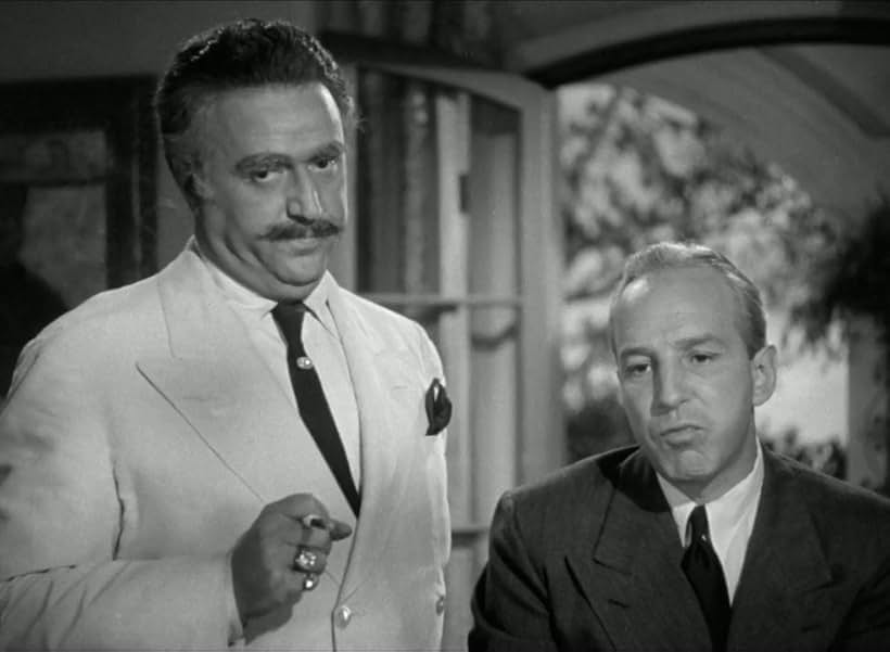 Hugo Haas and Lloyd Nolan in Two Smart People (1946)