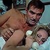 Ursula Andress and Stanley Baker in Perfect Friday (1970)