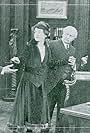 Marguerite Courtot and Richard Purdon in The Ancient Coin (1915)