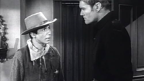 Chuck Connors and Johnny Crawford in Branded (1965)