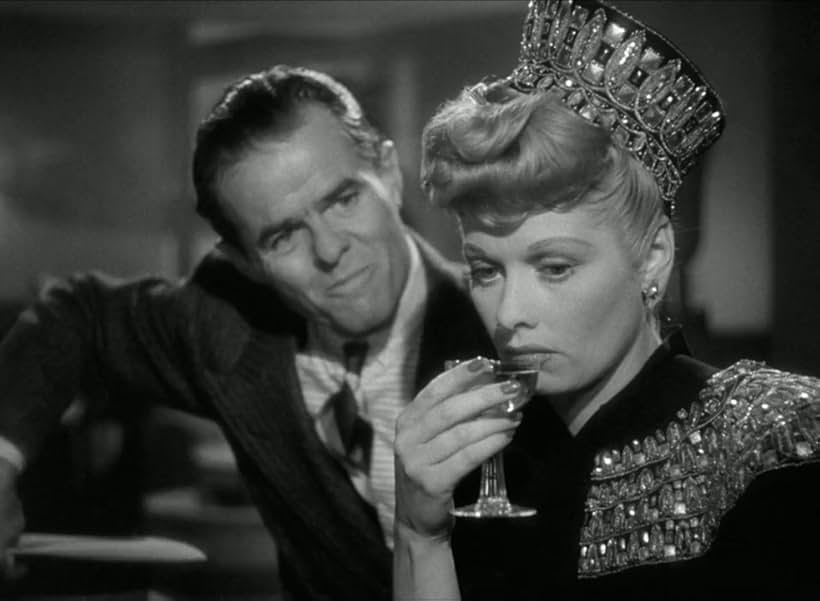 Lucille Ball and Elisha Cook Jr. in Two Smart People (1946)