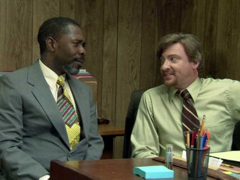 Michael Potts and Rhys Darby in Flight of the Conchords (2007)