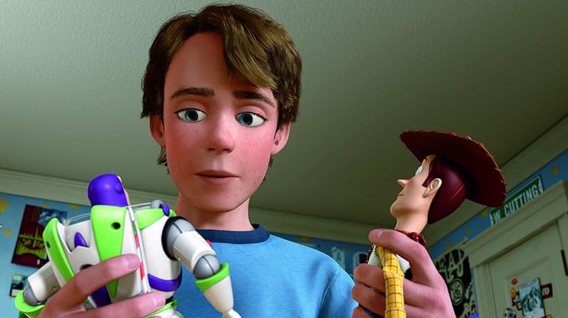 Tom Hanks, Tim Allen, and John Morris in Toy Story 3 (2010)