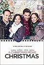 Lana McKissack, Ryan Merriman, Brant Daugherty, and Kimberly Daugherty in A Christmas Movie Christmas (2019)