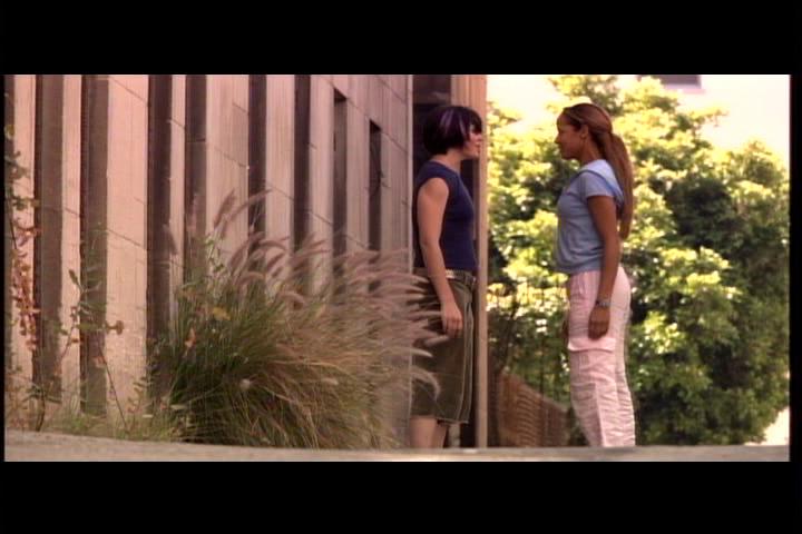 Dania Ramirez and Carmen Plumb in Little Black Boot (2004)