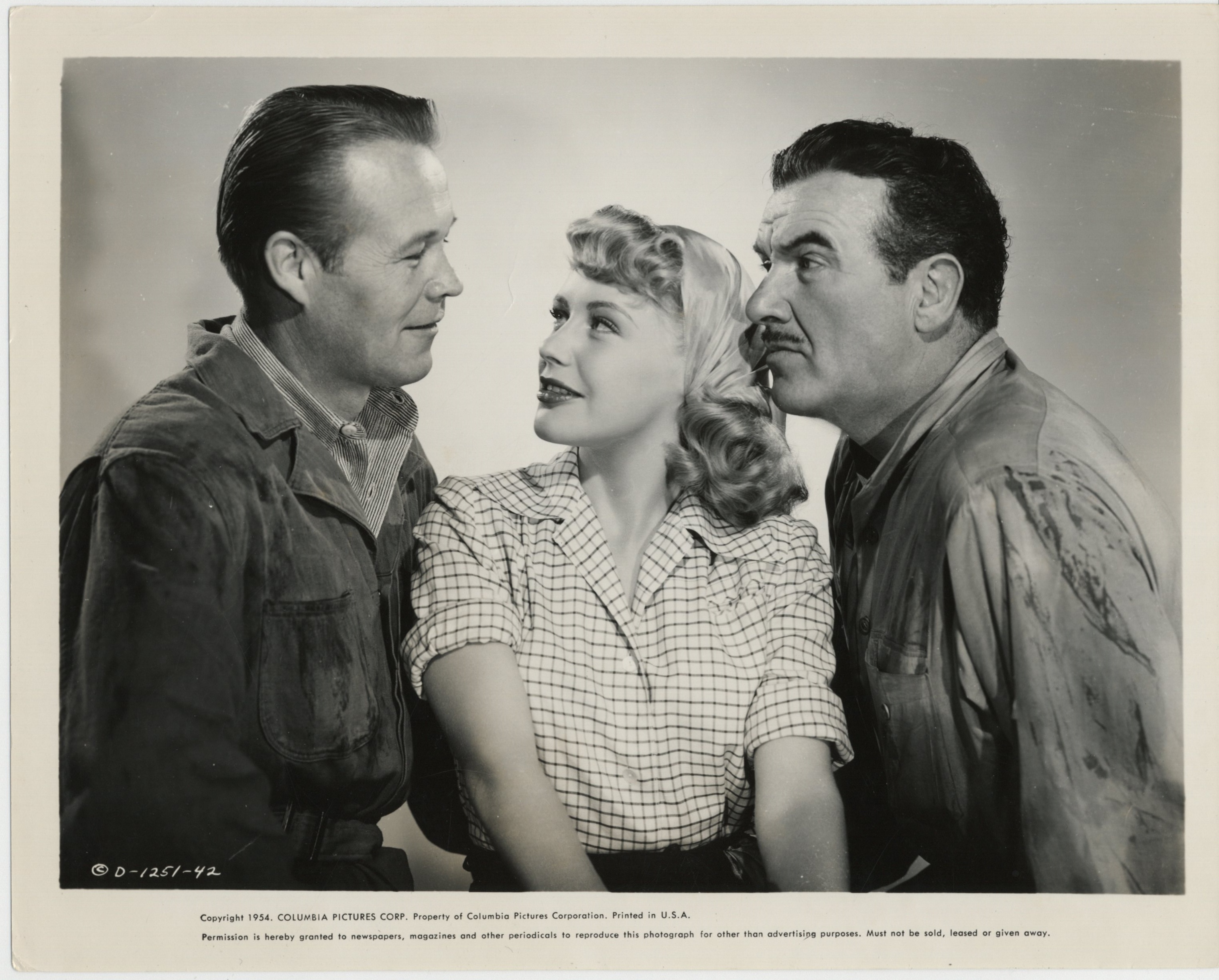 Preston Foster, Wayne Morris, and Dorothy Patrick in The Big Gusher (1951)