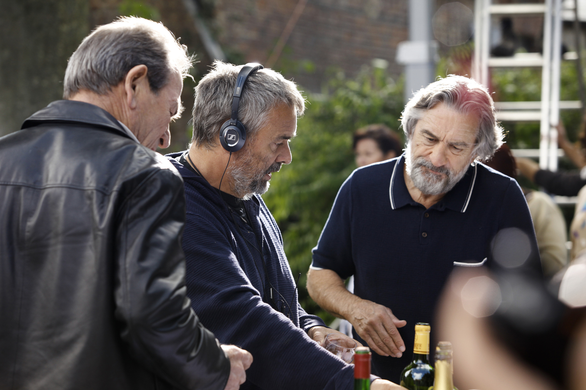 Luc Besson, Robert De Niro, and Tommy Lee Jones in The Family (2013)