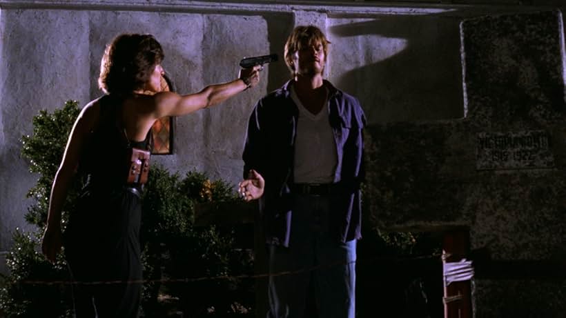 Blake Adams and Ashley Laurence in Lurking Fear (1994)