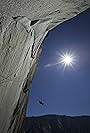 Stephen Wampler hanging in mid air on the edge of El Capitan. 