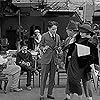 Charles Chaplin, Henry Bergman, Edna Purviance, and Loyal Underwood in The Chaplin Revue (1959)