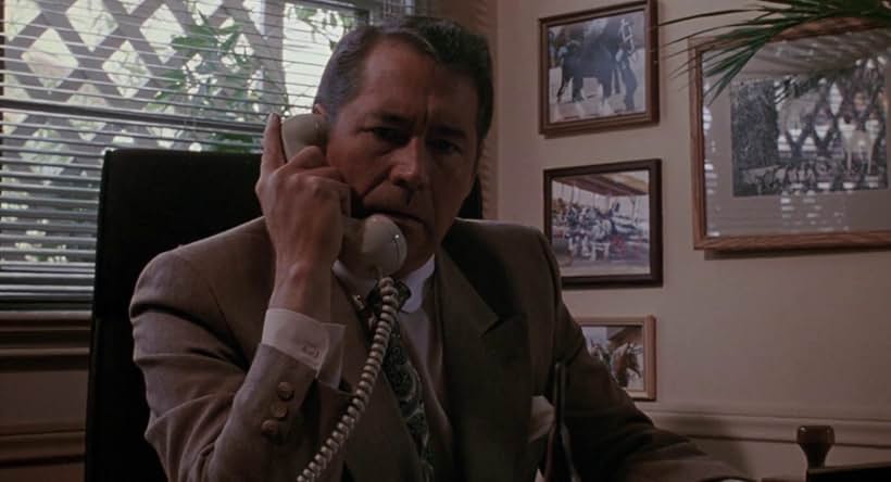 Barry Corbin in Nothing in Common (1986)