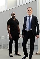 Morris Chestnut and Bruce Greenwood in Whistleblower (2019)