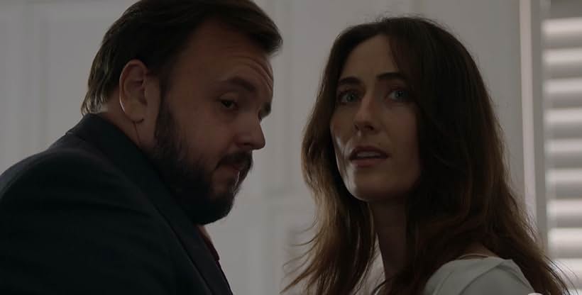 Claire Lovering and John Bradley in North Shore (2023)