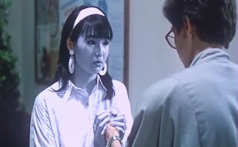 Maggie Cheung and Raymond Pak-Ming Wong in Happy Ghost III (1986)