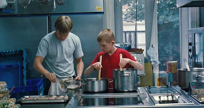 Jérémie Renier and Thomas Doret in The Kid with a Bike (2011)