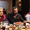 Nejat Isler, Emel Göksu, and Mert Denizmen in Aile (2023)