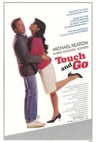 Michael Keaton and Maria Conchita Alonso in Touch and Go (1986)