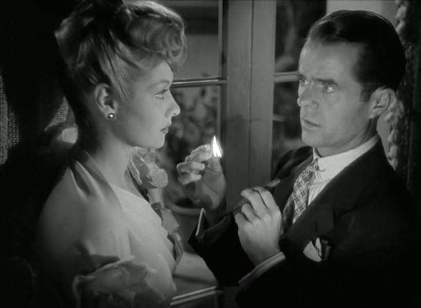 Lucille Ball and Elisha Cook Jr. in Two Smart People (1946)