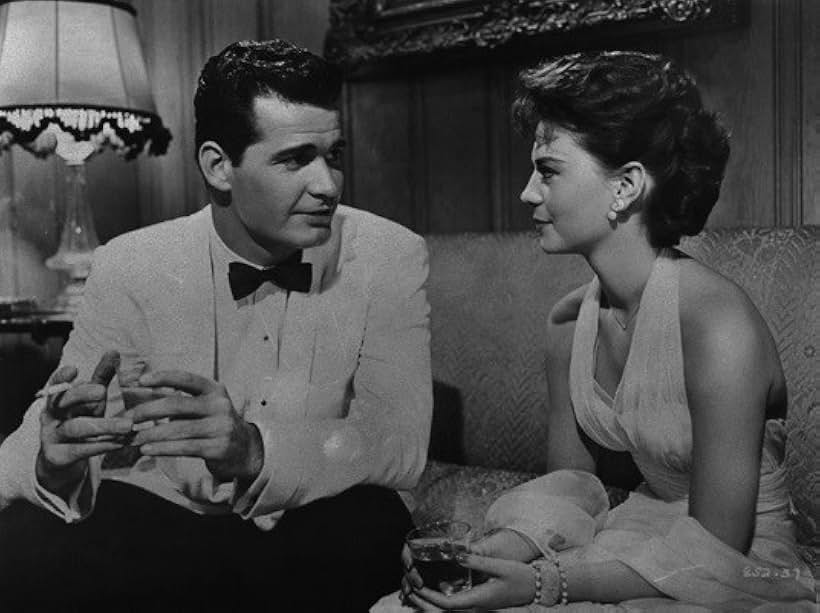 Natalie Wood and James Garner in Cash McCall (1960)