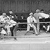 Charles Chaplin and Bill Cato in The Champion (1915)