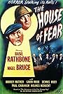 Basil Rathbone and Nigel Bruce in The House of Fear (1945)