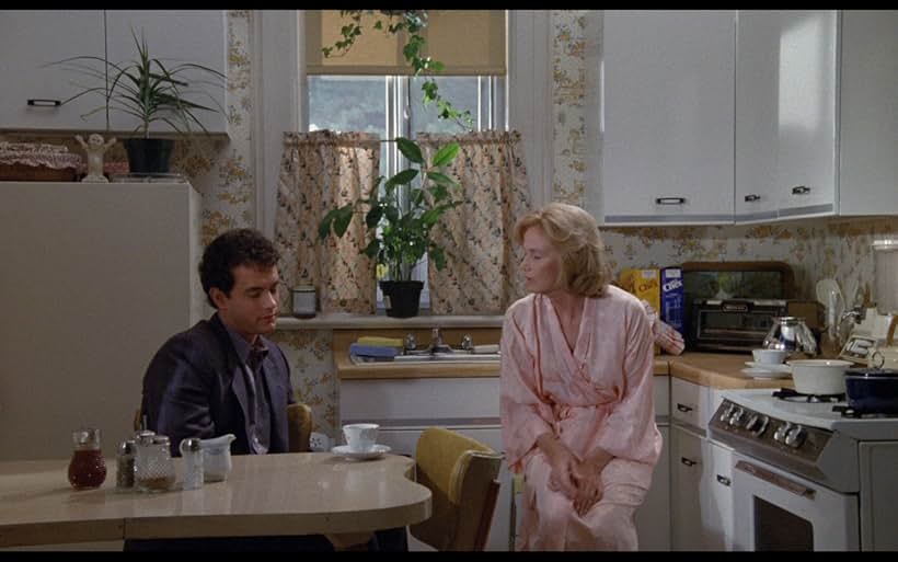 Tom Hanks and Eva Marie Saint in Nothing in Common (1986)