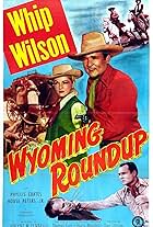 Phyllis Coates, I. Stanford Jolley, Robert J. Wilke, and Whip Wilson in Wyoming Roundup (1952)