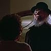 Keye Luke and Frances Lee McCain in Gremlins (1984)