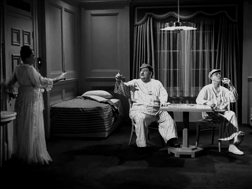 Oliver Hardy, Esther Howard, and Stan Laurel in The Big Noise (1944)