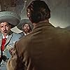 Robert Mitchum, Mike Luna, and Víctor Manuel Mendoza in The Wonderful Country (1959)