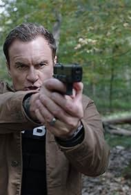 Julian McMahon in Defender (2020)