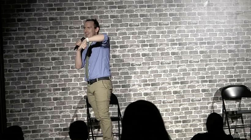 Hosting a live comedy show at Upstage Comedy Lounge