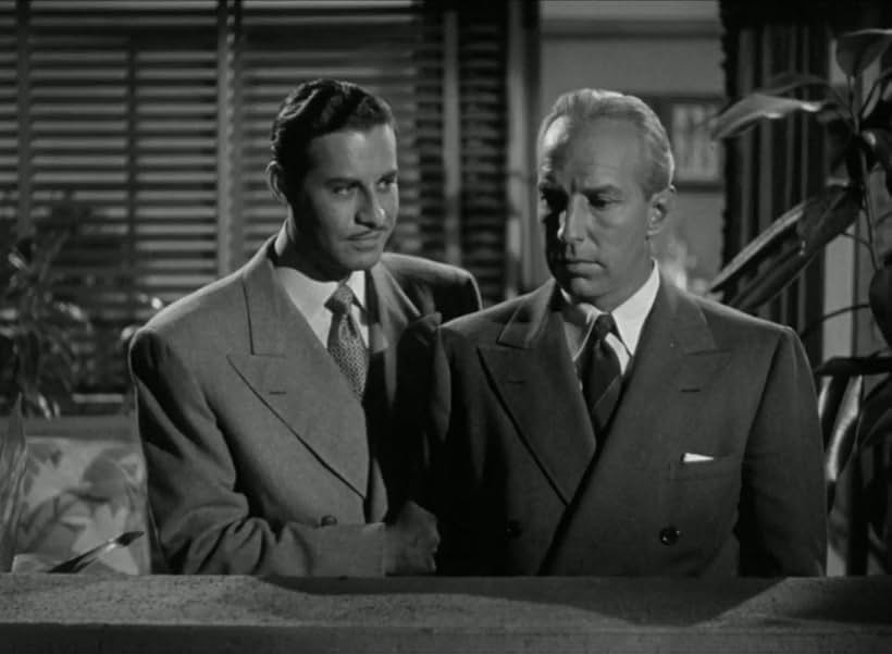 John Hodiak and Lloyd Nolan in Two Smart People (1946)