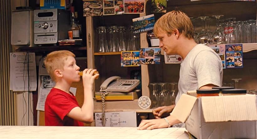 Jérémie Renier and Thomas Doret in The Kid with a Bike (2011)