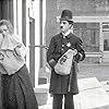 Charles Chaplin and Leota Bryan in Easy Street (1917)