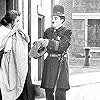 Charles Chaplin and Leota Bryan in Easy Street (1917)