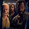 Liam Cunningham, Corey Hawkins, and Chris Walley in The Last Voyage of the Demeter (2023)