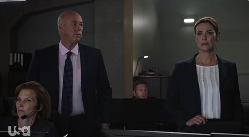 Michelle Forbes and Michael Gaston in The Seoul Asylum (2019)