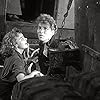 Cameron Mitchell and Terry Moore in Man on a Tightrope (1953)