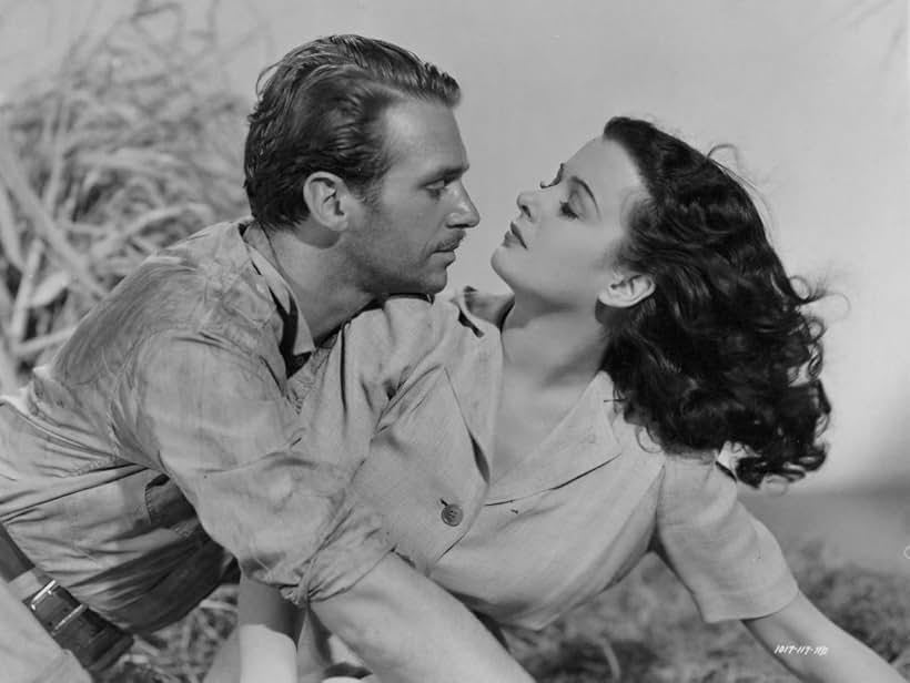 Joan Bennett and Douglas Fairbanks Jr. in Green Hell (1940)