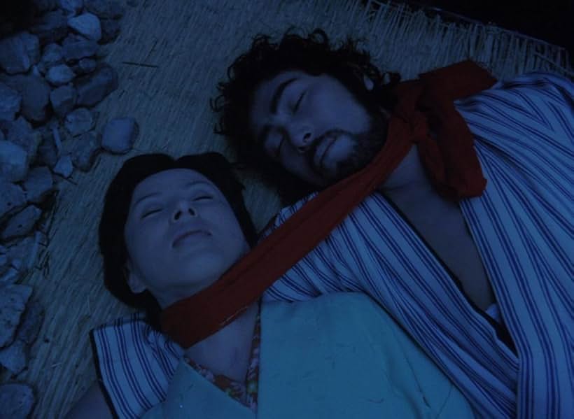 Yoshio Harada and Kaoru Yachigusa in Pastoral: To Die in the Country (1974)