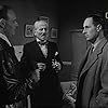 Gerald Case, Guy Deghy, and Hugo Schuster in Night Plane to Amsterdam (1955)