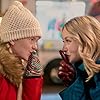 Emily Tennant and Myla Volk in Holiday Hotline (2023)