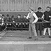 Lloyd Bacon, Bud Jamison, and Ernest Van Pelt in The Champion (1915)