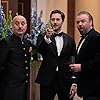 Anupam Kher, Tyler Labine, and Ryan Eggold in Liftoff (2020)