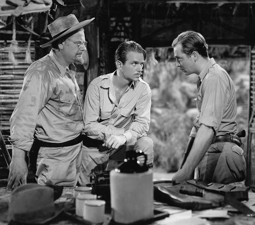 Douglas Fairbanks Jr., Alan Hale, and John Howard in Green Hell (1940)