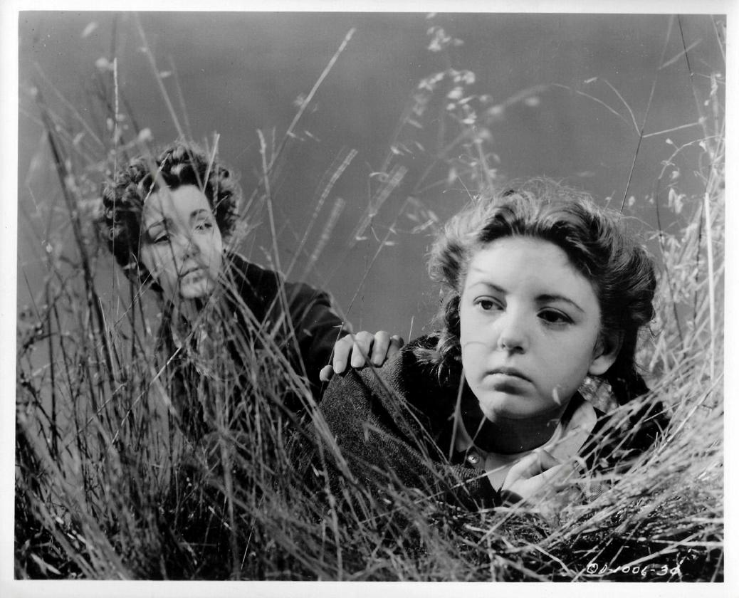 Marsha Hunt and Shirley Mills in None Shall Escape (1944)