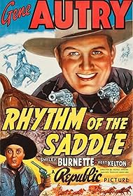 Gene Autry and Smiley Burnette in Rhythm of the Saddle (1938)