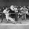 Charles Chaplin, Lloyd Bacon, and Bud Jamison in The Champion (1915)