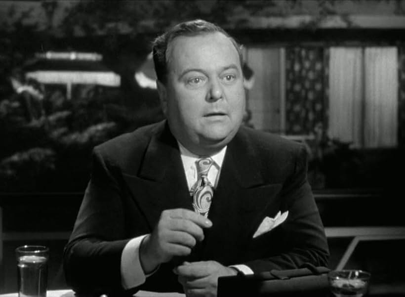 Lloyd Corrigan in Two Smart People (1946)